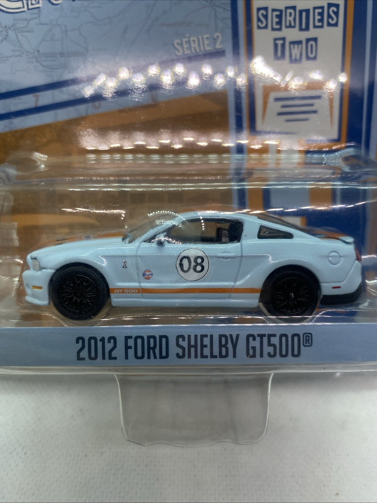 Close-up GreenLight 2012 Ford Shelby GT500 die-cast car in clear blister, number 08