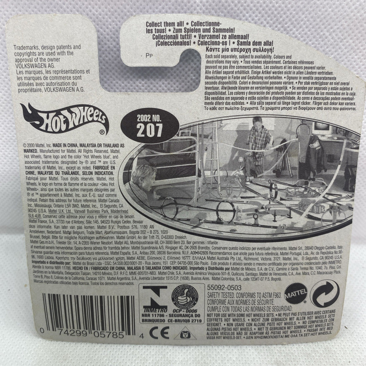 Toy car blister pack back card with barcode and small vehicle photo.