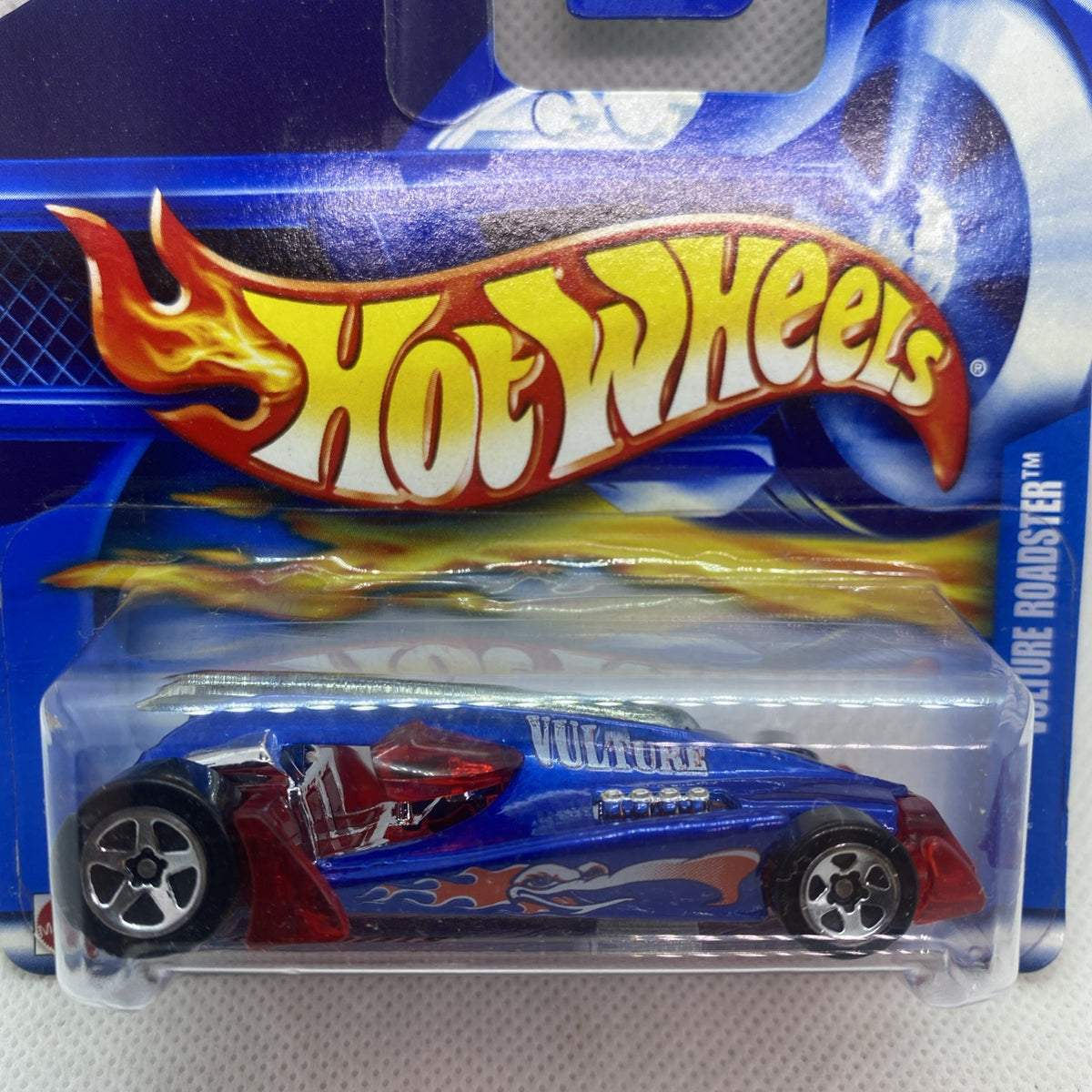 Blue Vulture Roadster die-cast with red flame decals and silver wheels in clear blister