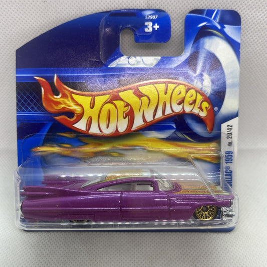 Purple Hot Wheels die-cast car in blue blister pack, side view