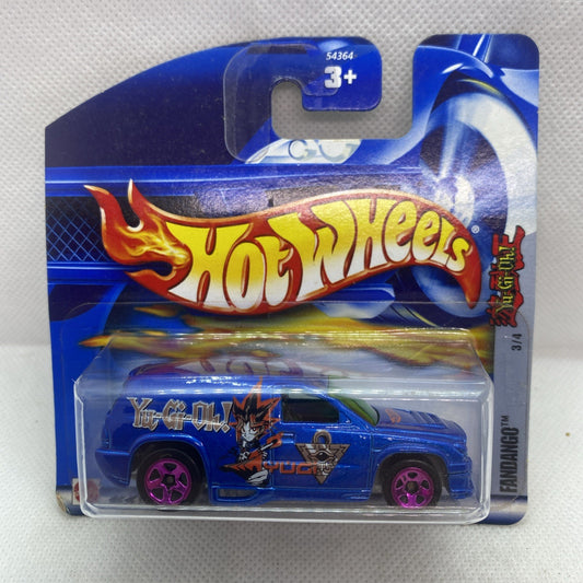 Hot Wheels die-cast car blister pack with blue Yu-Gi-Oh themed truck, sealed.