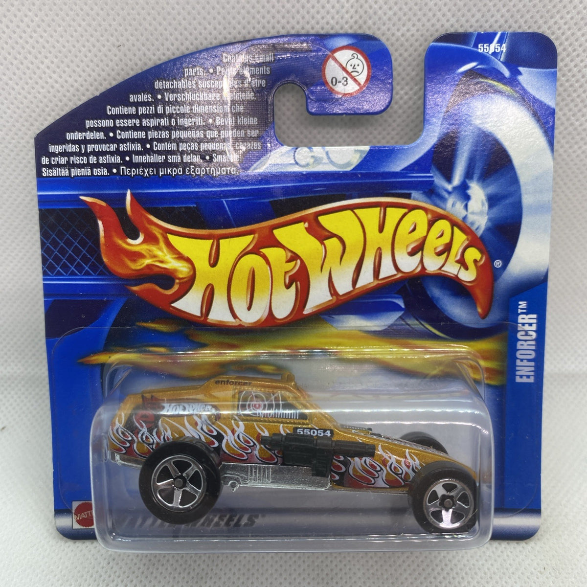 Hot Wheels Enforcer die-cast car in blister pack, flame decal, gray and black