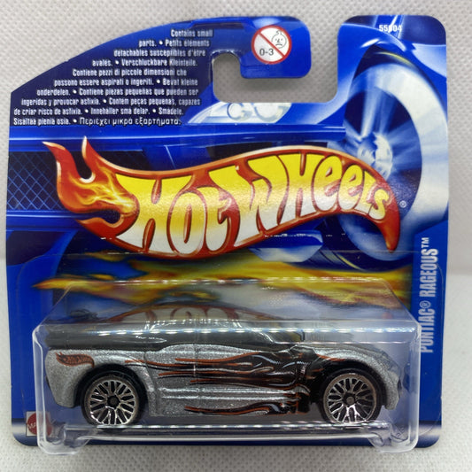Hot Wheels die-cast toy car in blue blister pack, silver with flame graphics