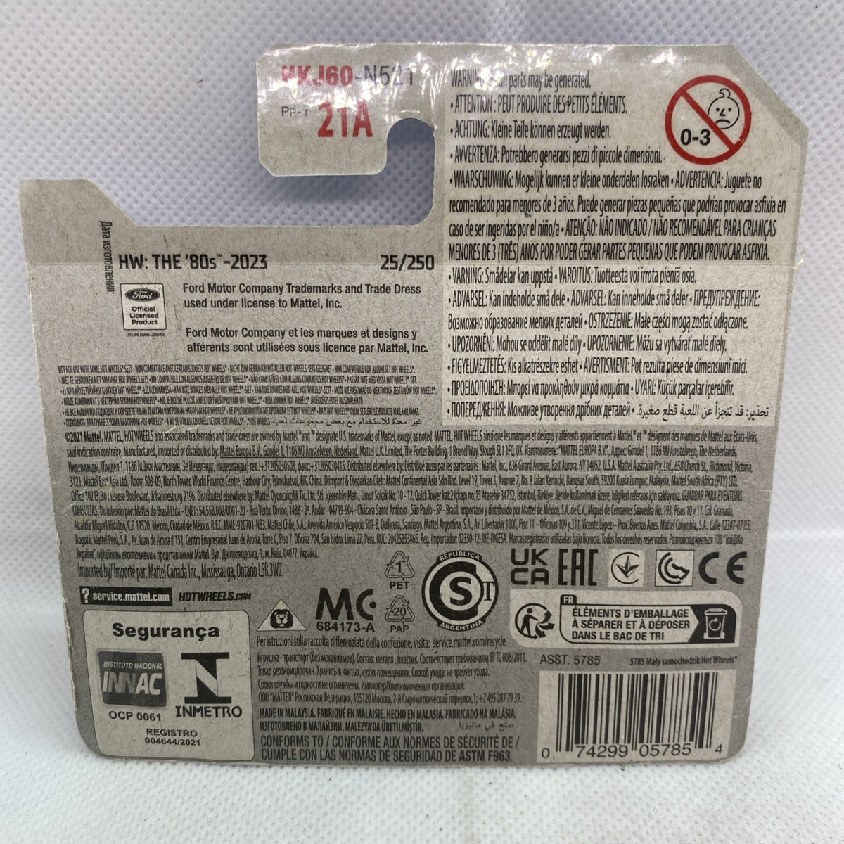 Back of blister card with product details and warning icons