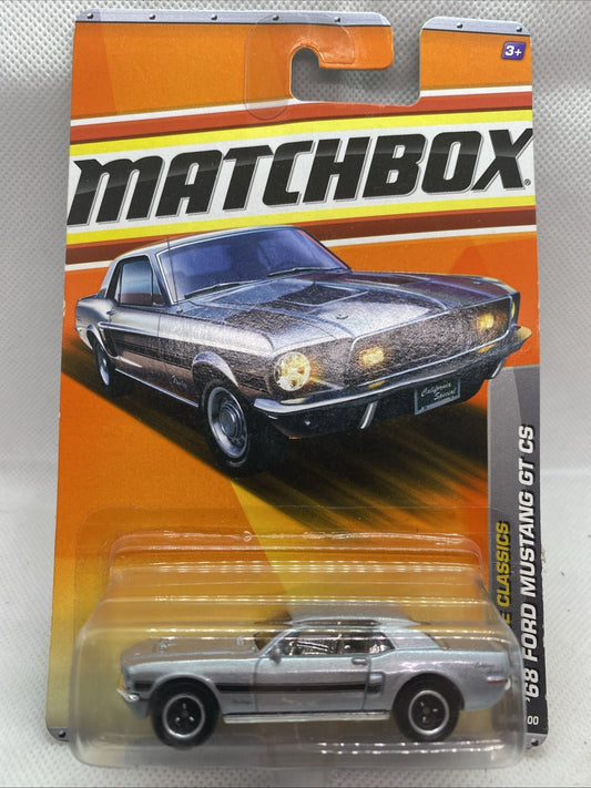 Matchbox 1968 Ford Mustang die-cast car on sealed blister card, dark gray and black.