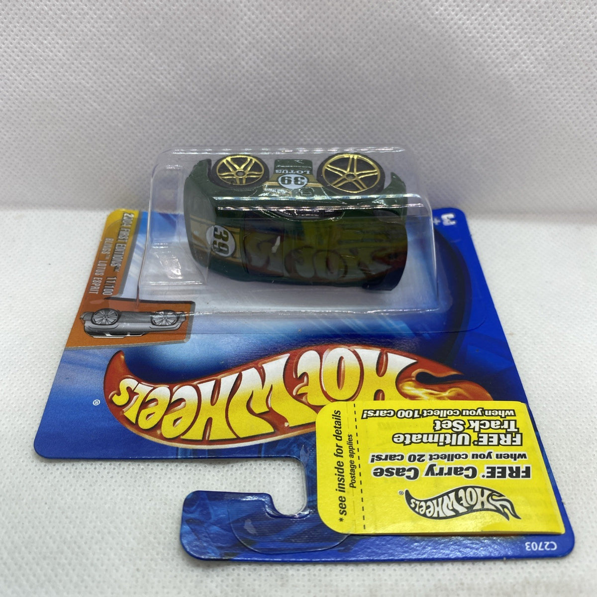 Green Hot Wheels toy car in clear blister on blue card with Hot Wheels logo