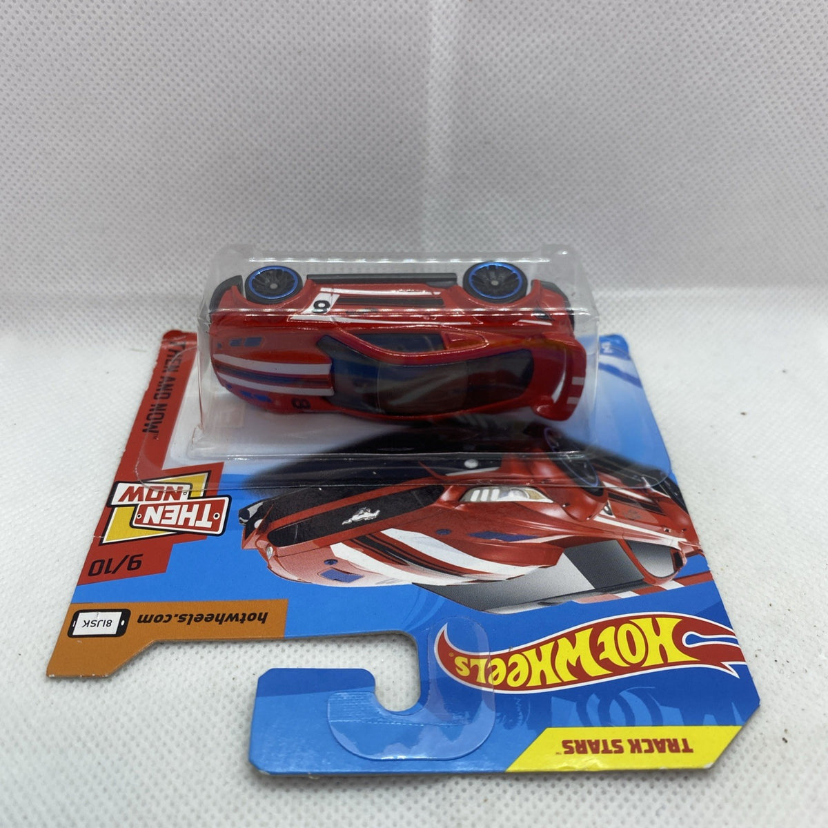 Hot Wheels carded red Custom '15 Ford Mustang die-cast car, top view in blister