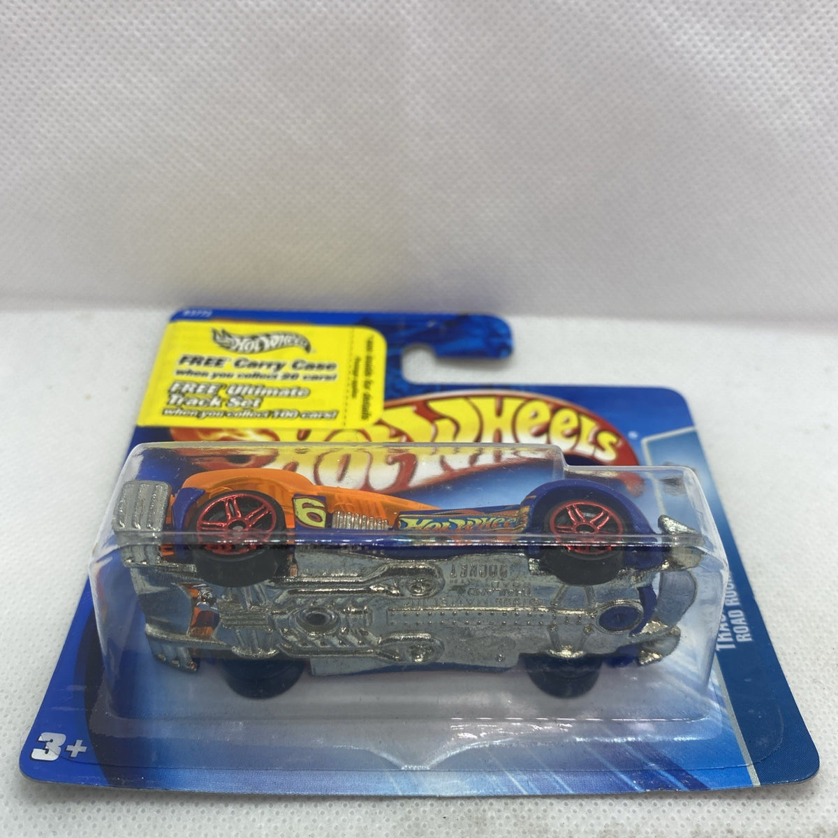 Hot Wheels Road Rocket die-cast car in blister, front view with gray engine detail