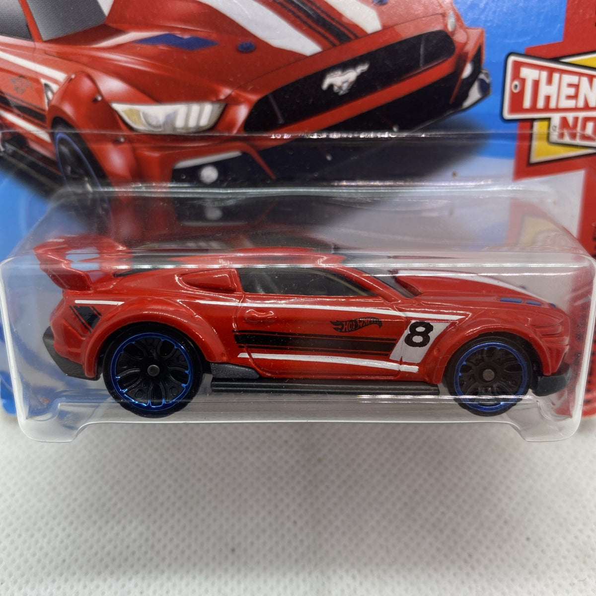 Hot Wheels Custom '15 Ford Mustang die-cast car in blister, red with #8 and blue wheels