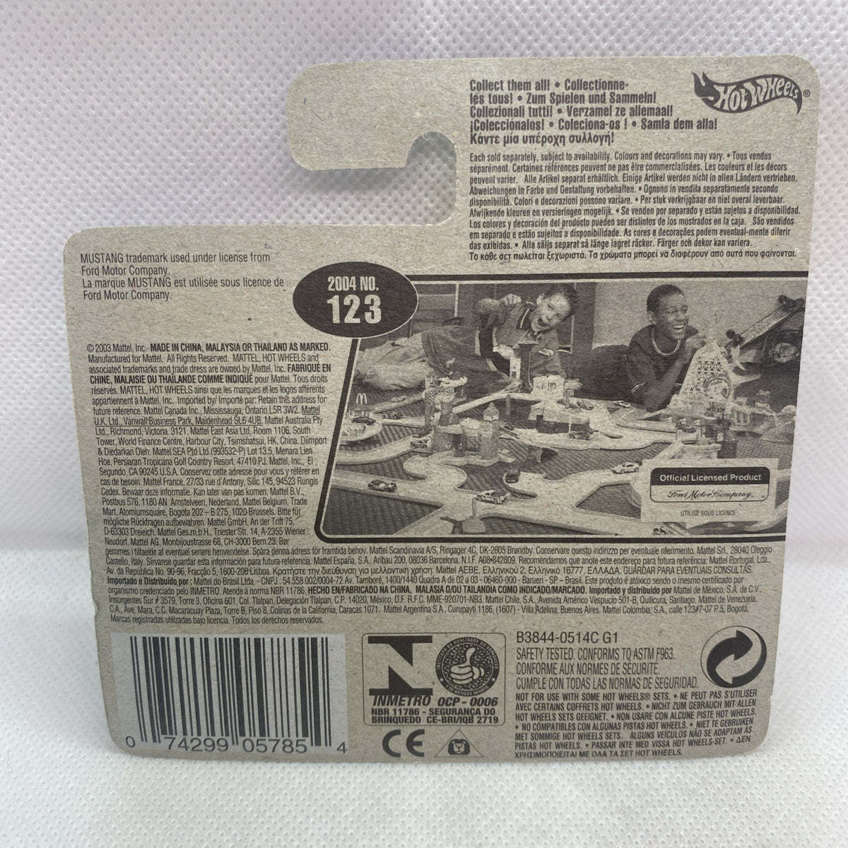 Back of Hot Wheels package with printed info, barcode, and blister backing