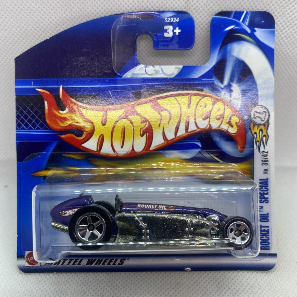 1:64 die-cast Rocket Oil hot rod in clear blister on Hot Wheels short card