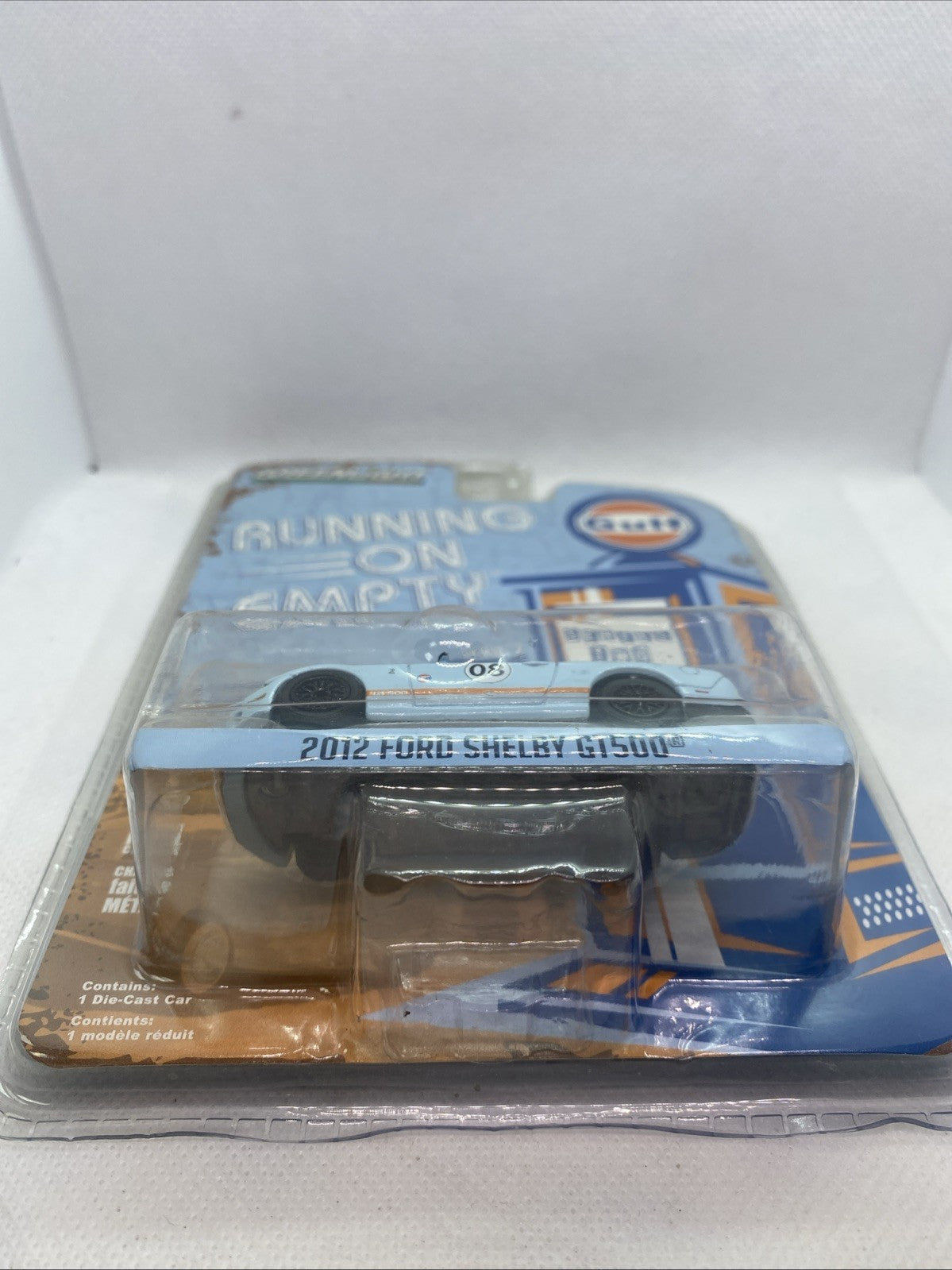 GreenLight die-cast blister pack showing side of white 2012 Ford Shelby GT500