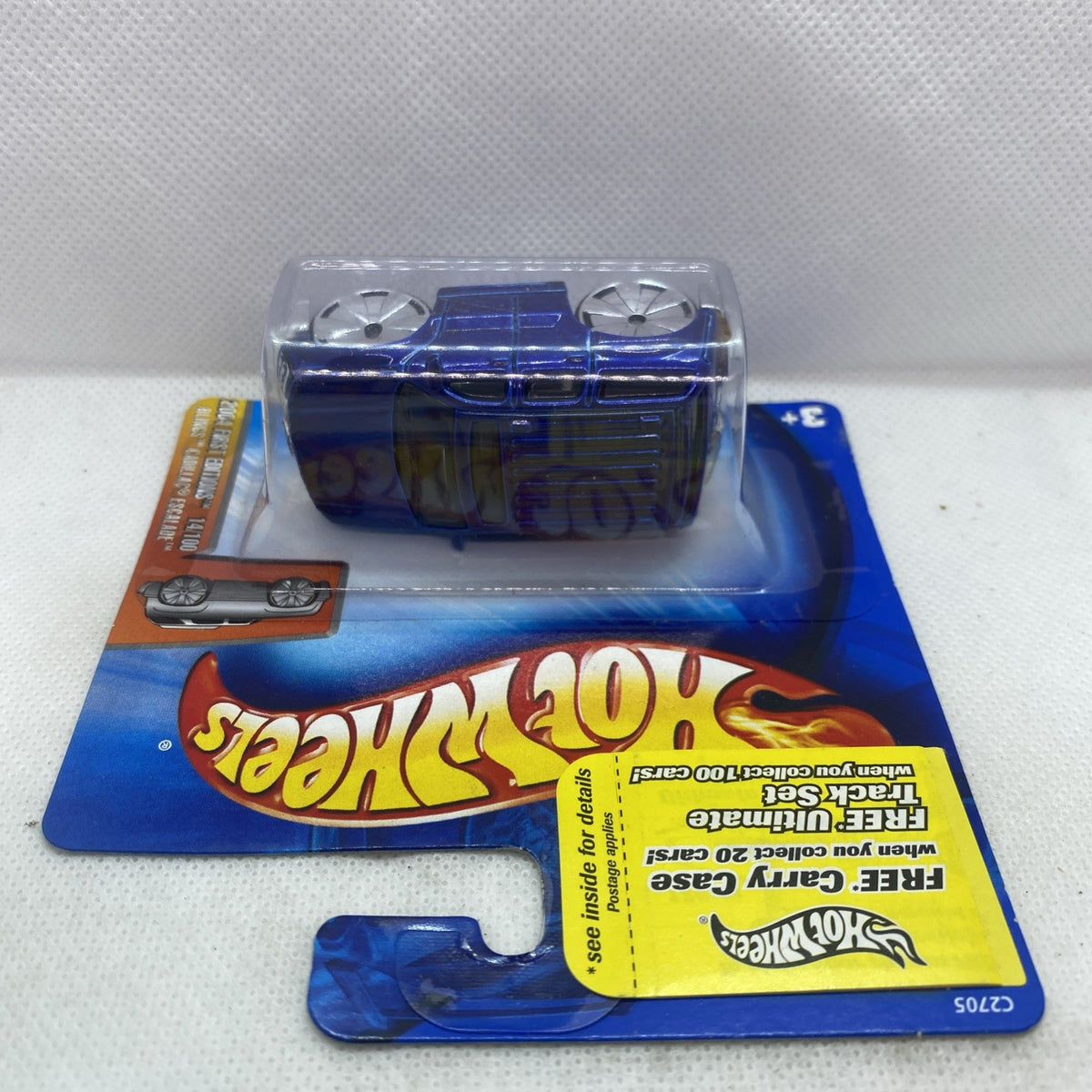 Blue die-cast SUV toy with chrome wheels in Hot Wheels blister card