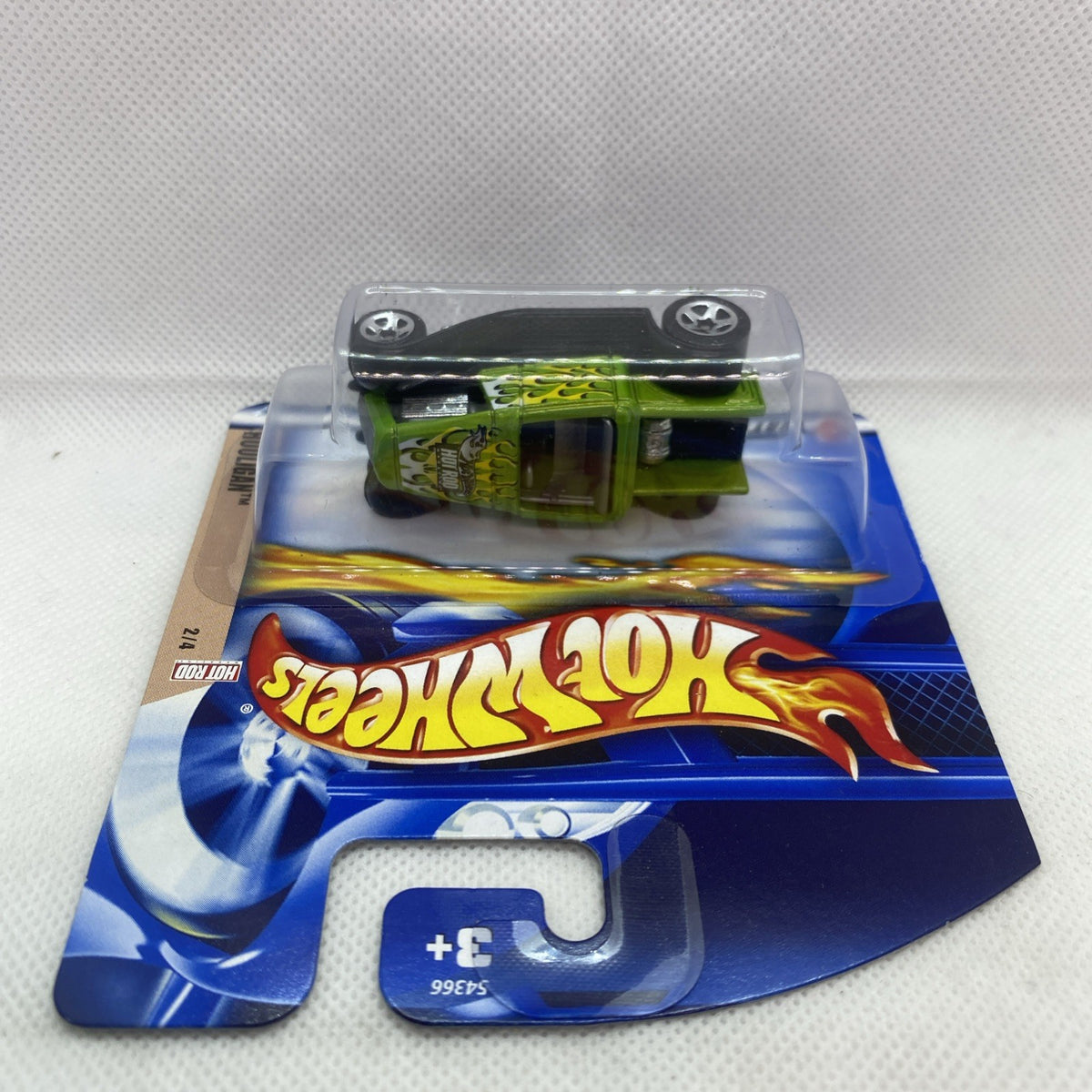 Hot Wheels Hooligan Hot Rod die-cast car in blue blister pack, top view showing black wheels.