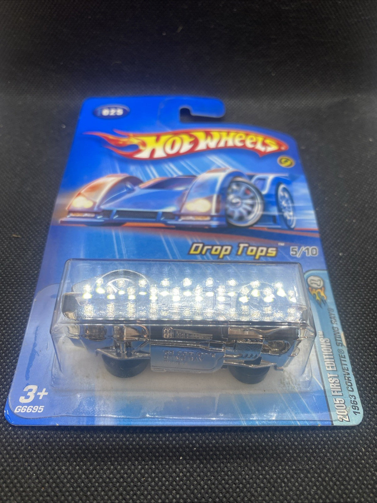 Hot Wheels Corvette model in silver blister on blue card, Drop Tops 6/10