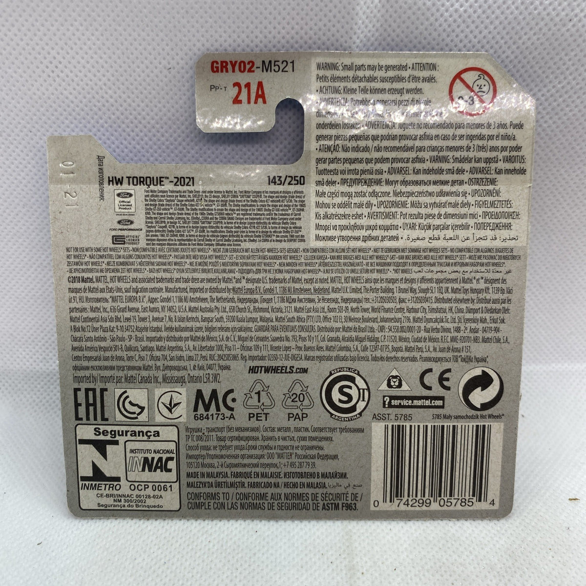 Hot Wheels card back with printed product info, icons, and barcode