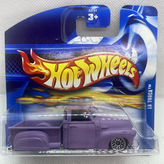 Lavender Hot Wheels La Troca Chevy pickup toy in clear blister on blue card