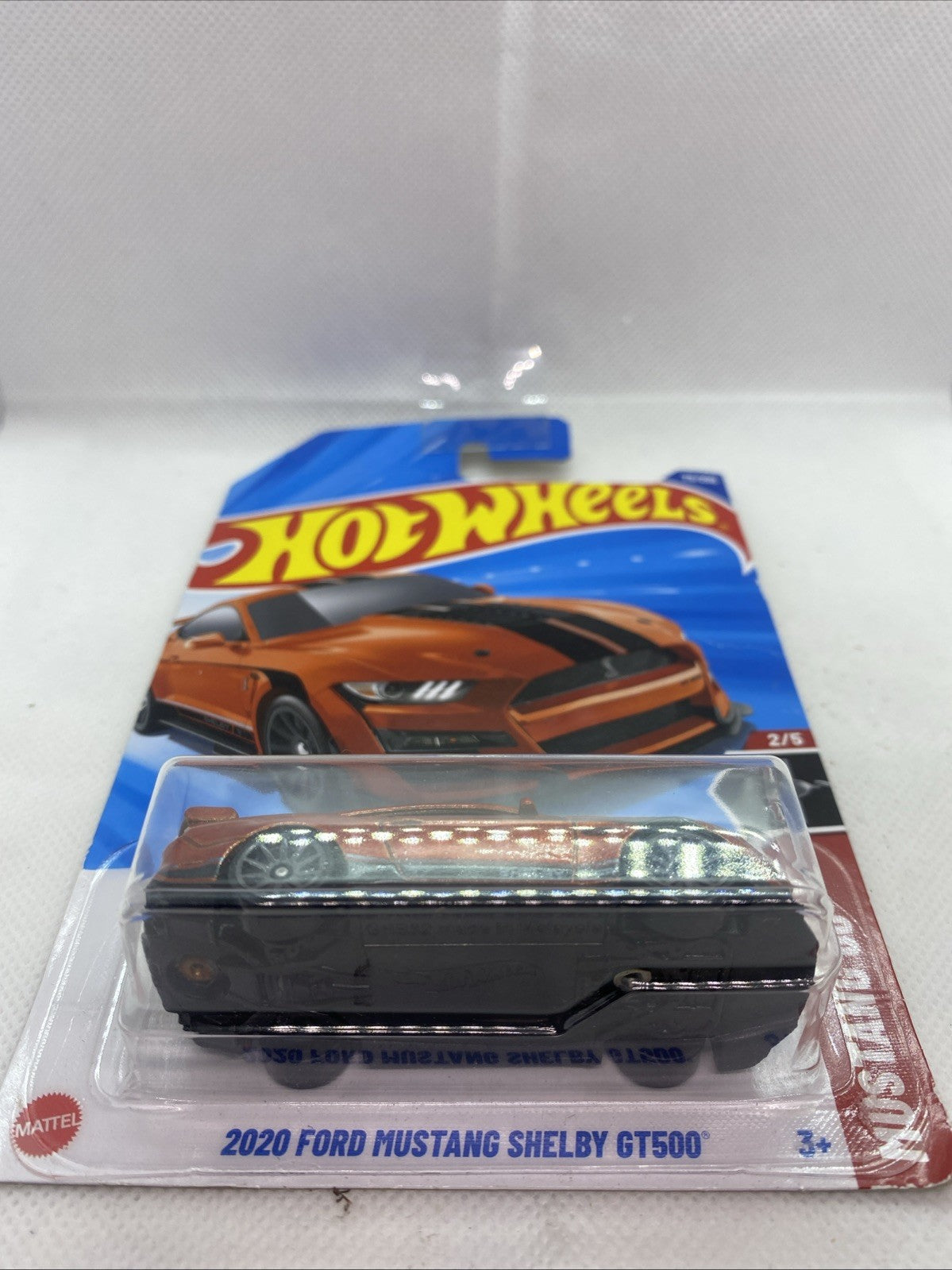 Hot Wheels die-cast Mustang Shelby GT500 in clear blister, dark wheels.