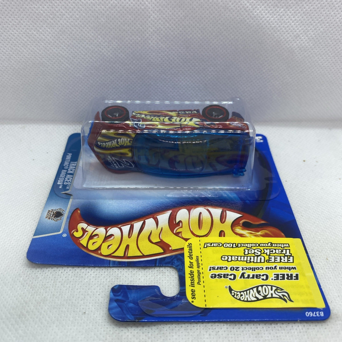 Hot Wheels die-cast car sealed in blister package on blue Hot Wheels card