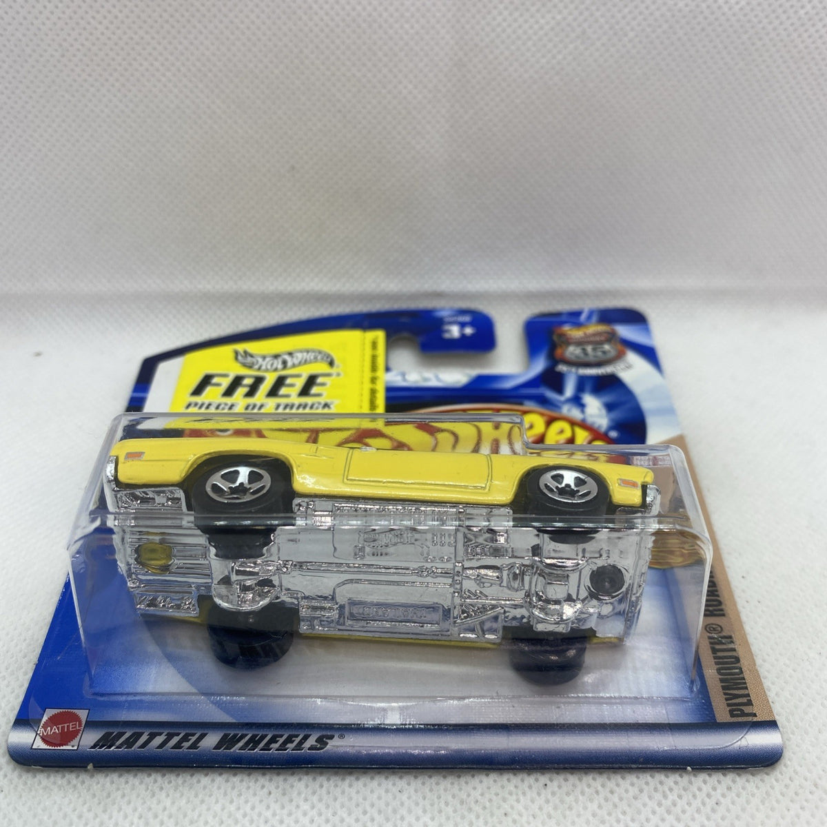 Hot Wheels blister card showing underside of yellow Roadrunner 1970 die-cast car