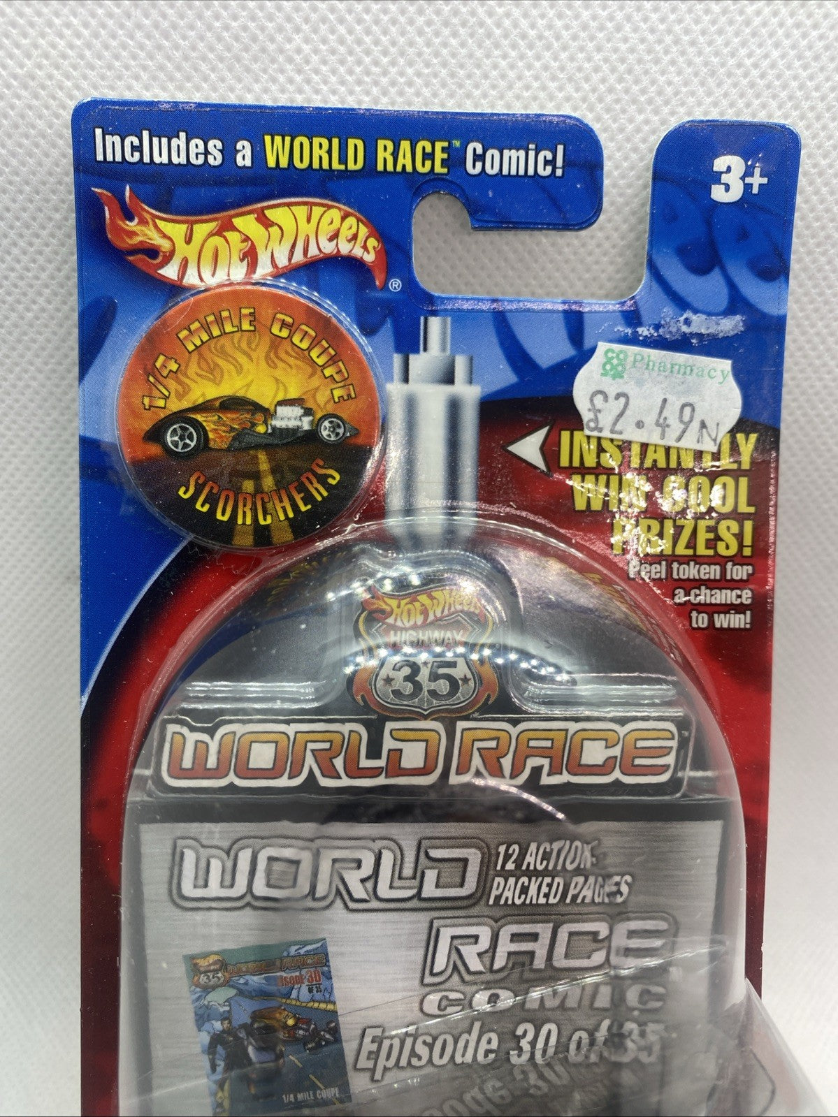 Sealed World Race blister pack front with Scorchers badge and 12 action features