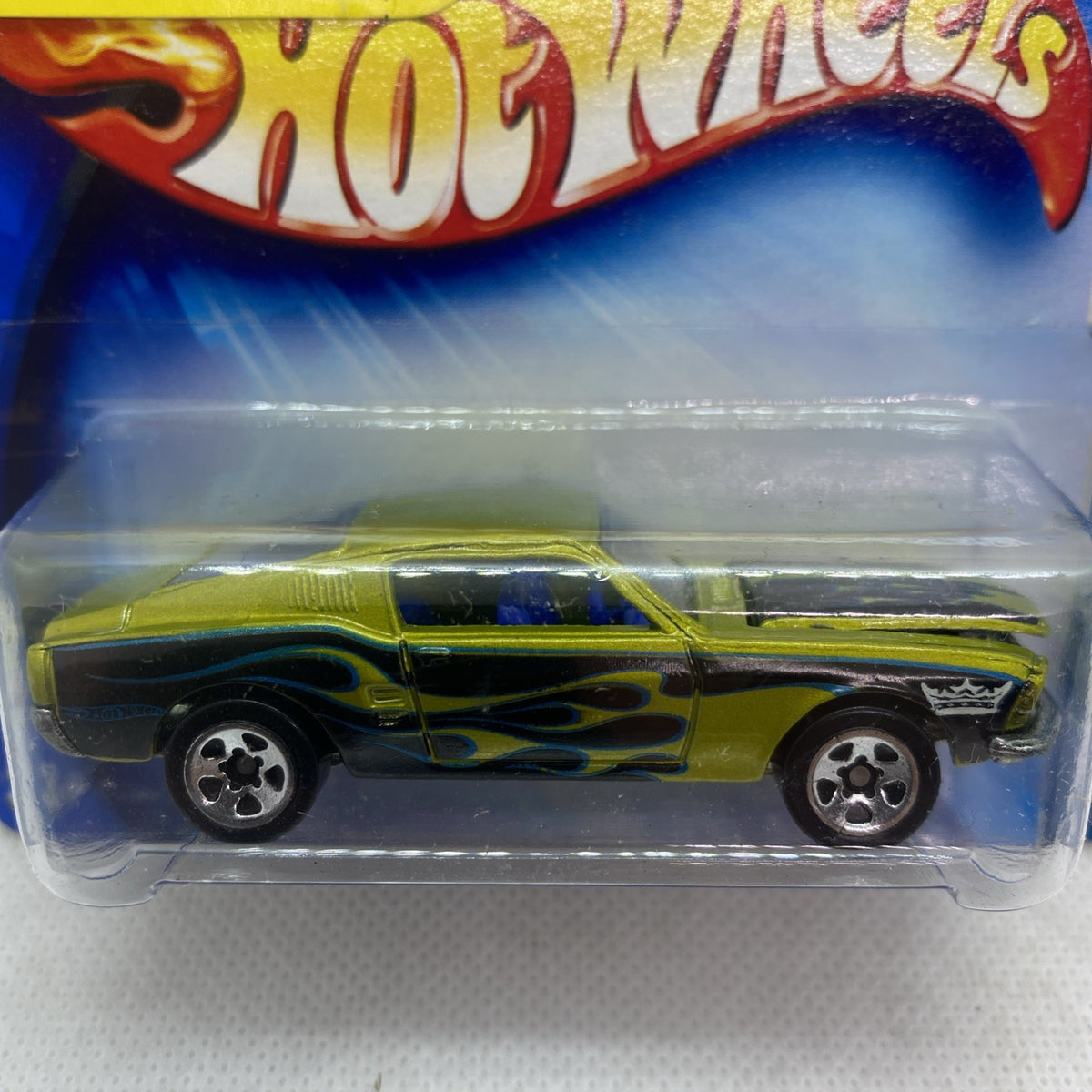 Hot Wheels Mustang 1968 Pride Rides green die-cast car close-up in clear blister
