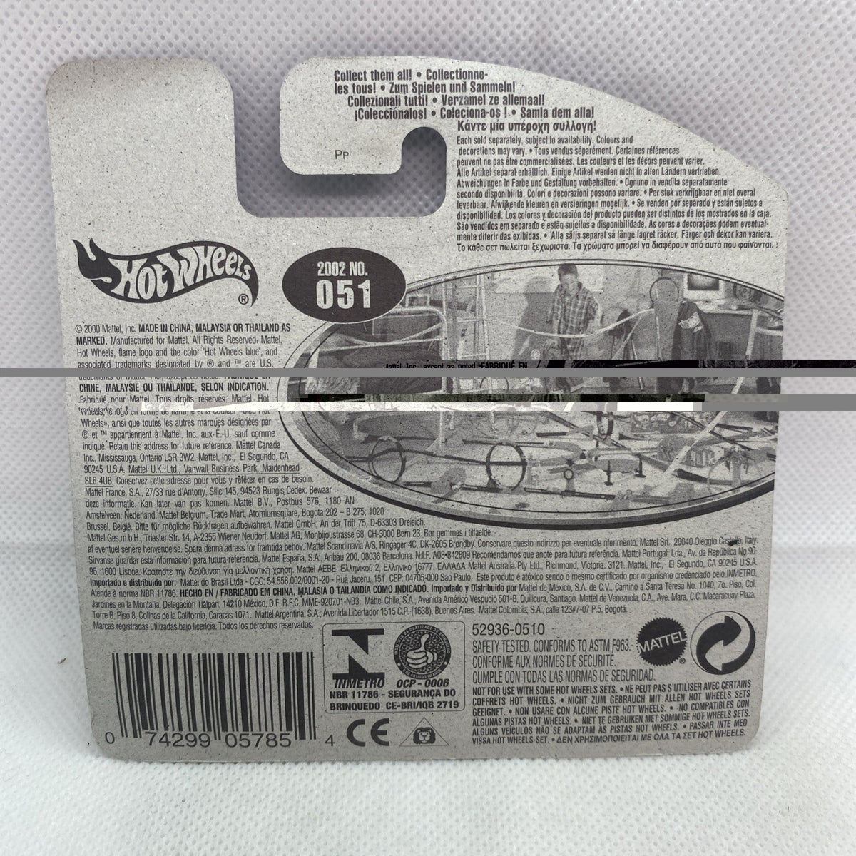 Back of sealed Hot Wheels car card with barcode and 2002 051 marking