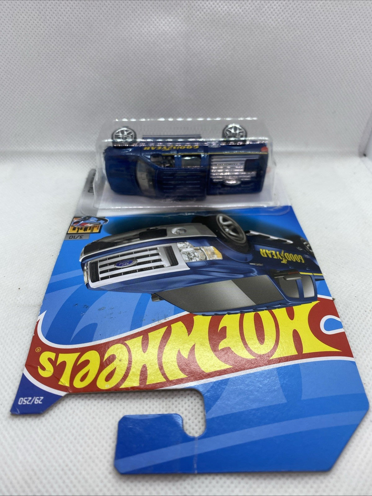 Hot Wheels HW Metro 2009 Ford F-150 die-cast truck with blister tray on blue card