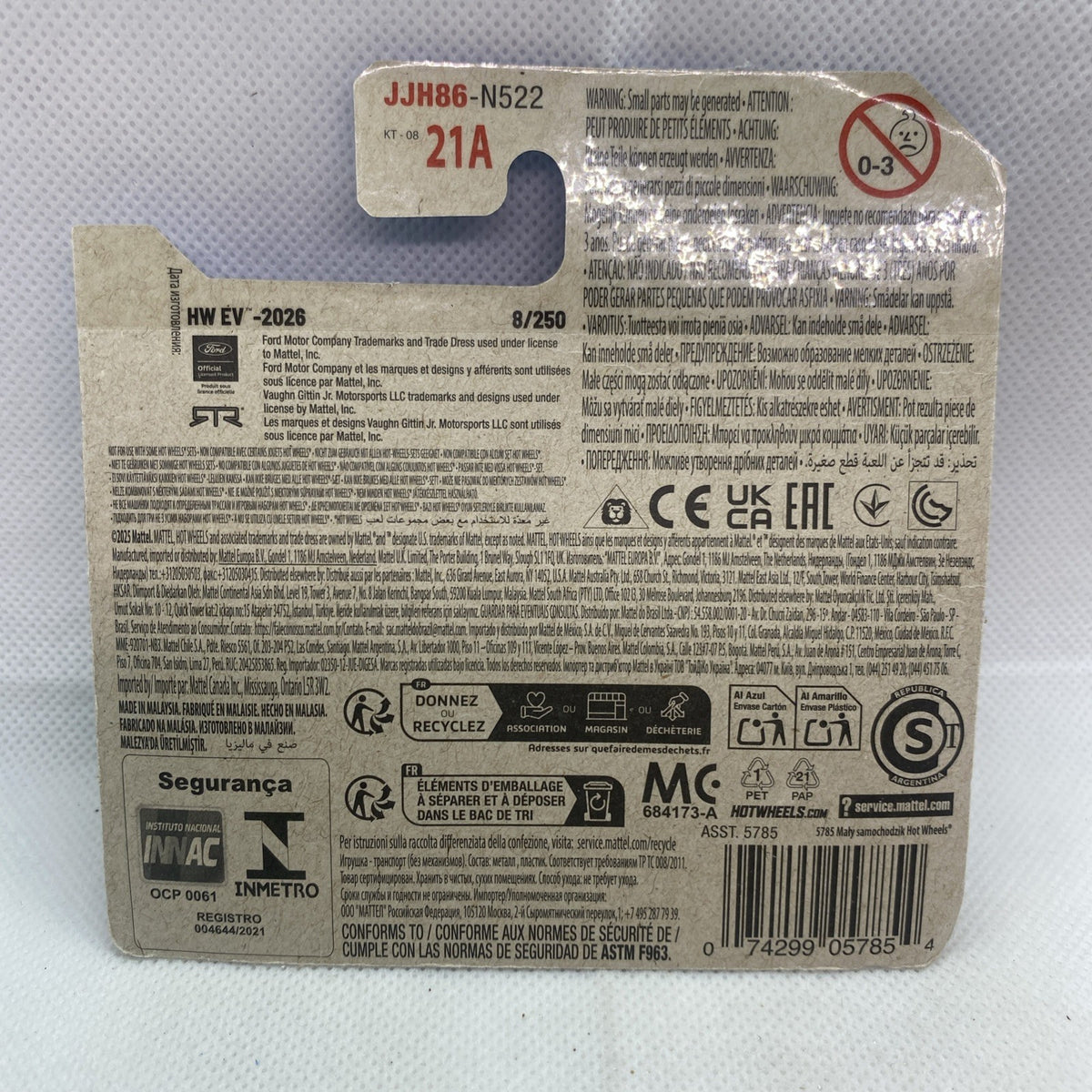 Back of Hot Wheels EV 2026 blister card with barcode, recycling and CE icons