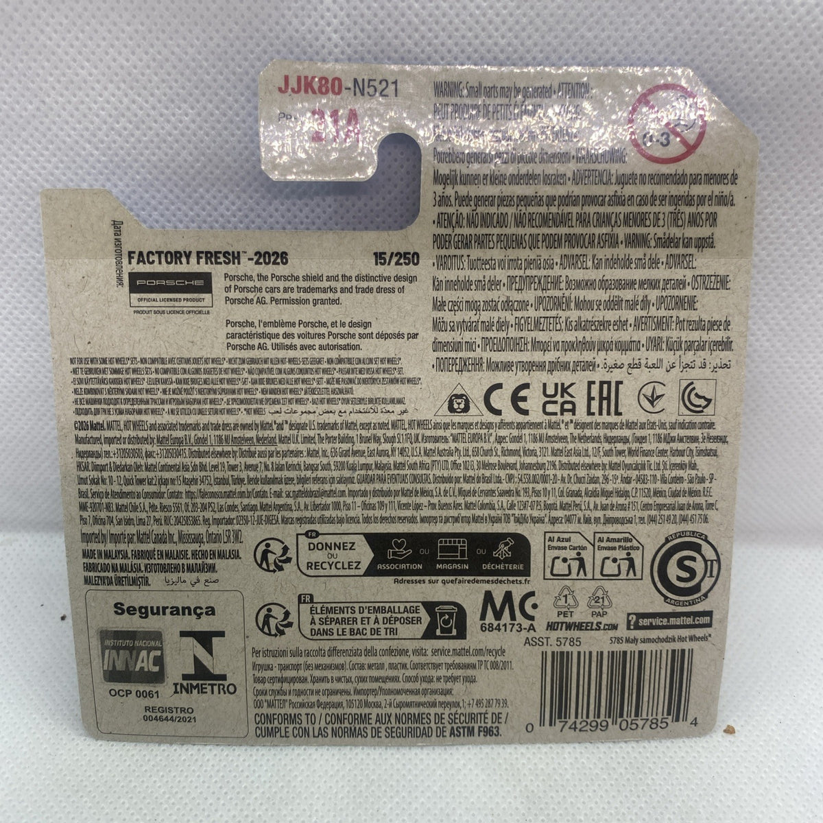 Hot Wheels blister card back with barcode and safety certification icons
