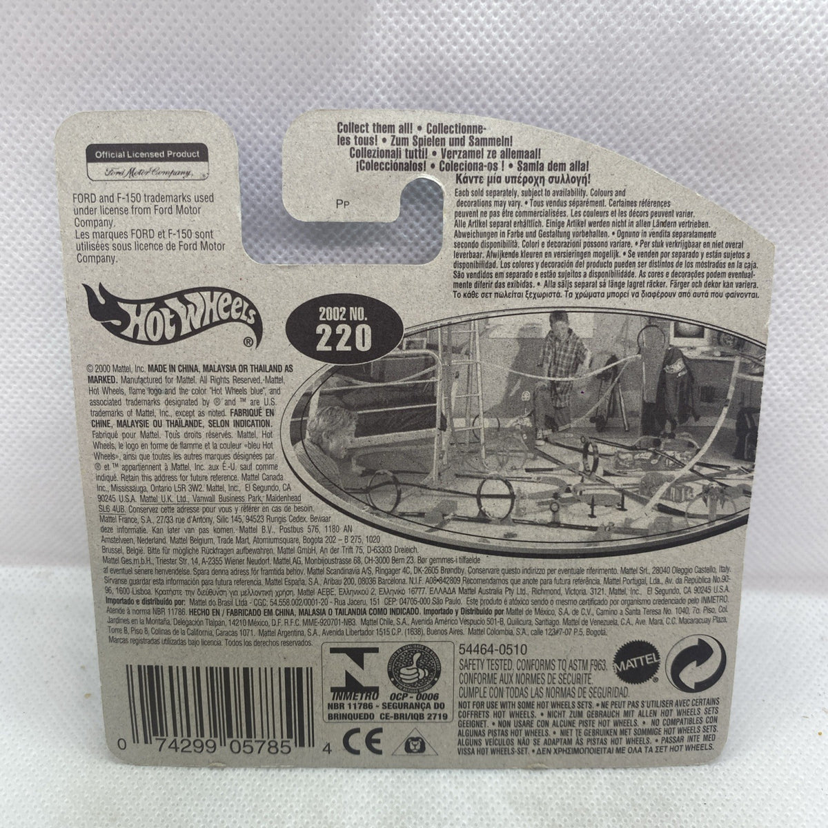 Hot Wheels purple 2002 Ford F-150 package back with specs text and photo