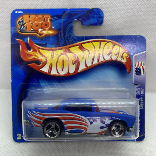 Die-cast car in blue Hot Wheels blister card, blue body with red-white flame graphics
