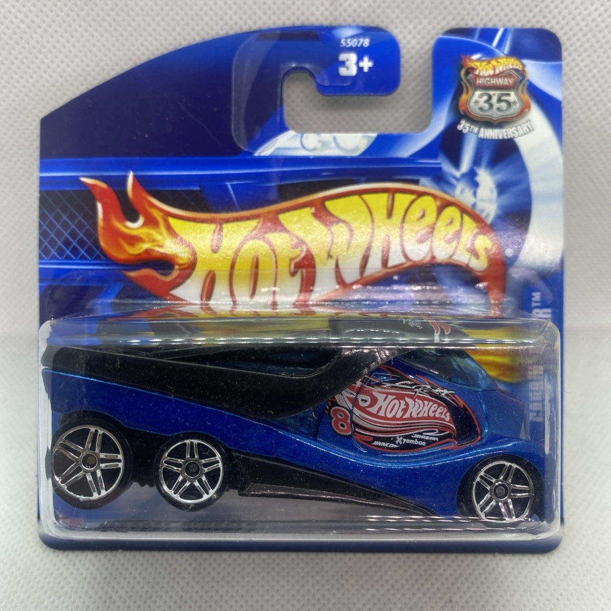 Blue Hot Wheels die-cast car in blister pack, flame graphics and chrome wheels