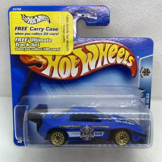Hot Wheels blue die-cast car in clear blister on blue card with yellow logo