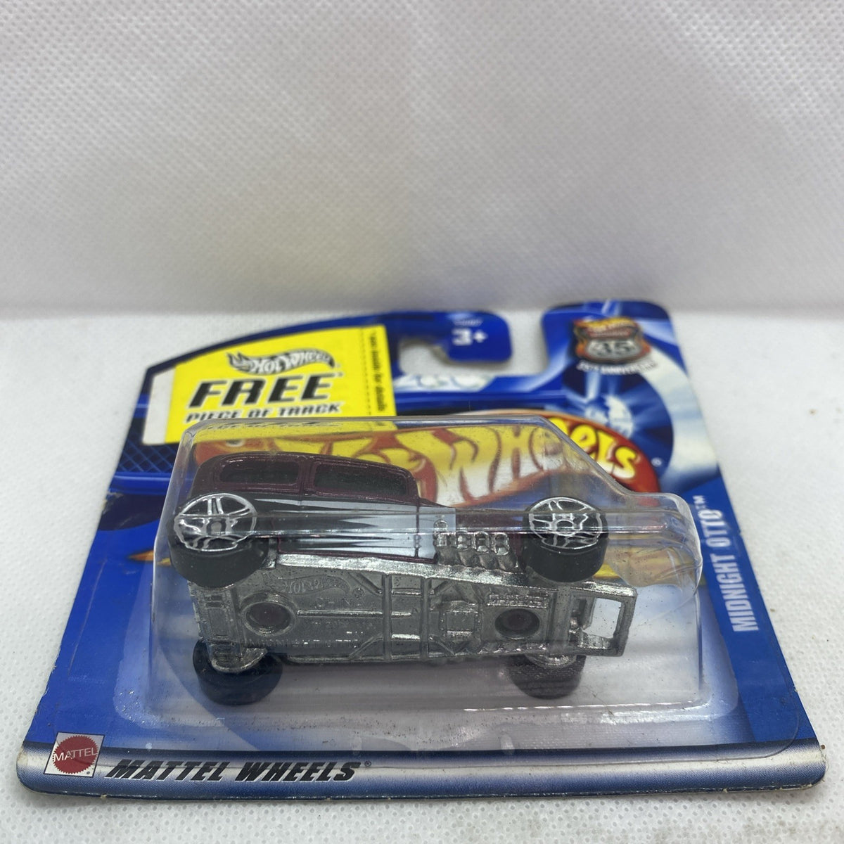 Hot Wheels Midnight Otto die-cast car blister pack with chrome wheels, sealed