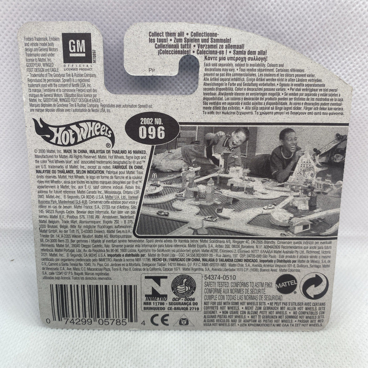 Hot Wheels car card back with barcode and product info on paper insert