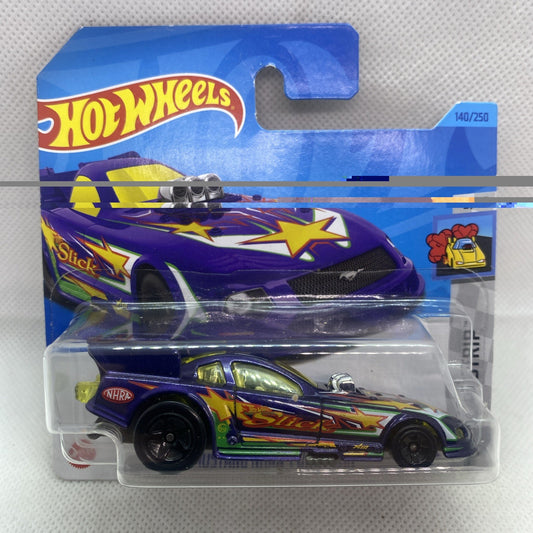 Hot Wheels NHRA Funny Car die-cast in purple-blue blister card with black wheels