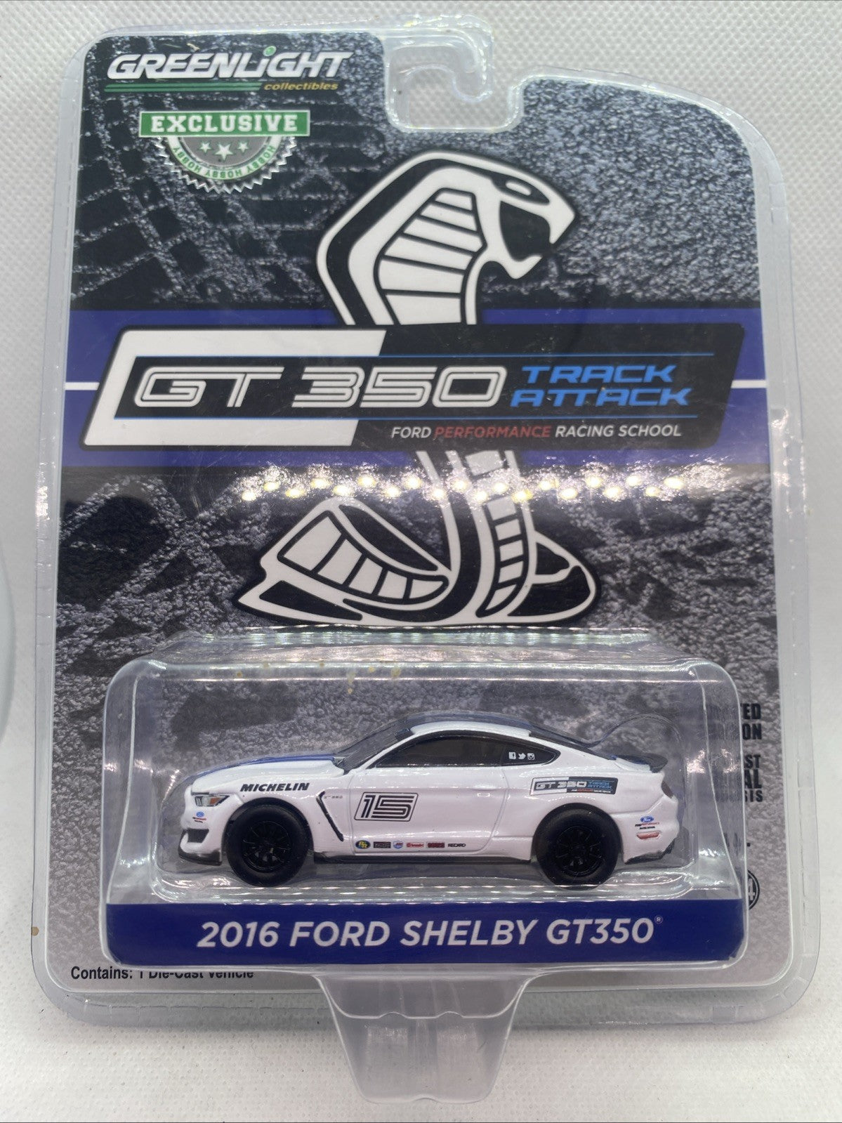 Sealed die-cast race car in clear blister package, white Ford Shelby with number 15