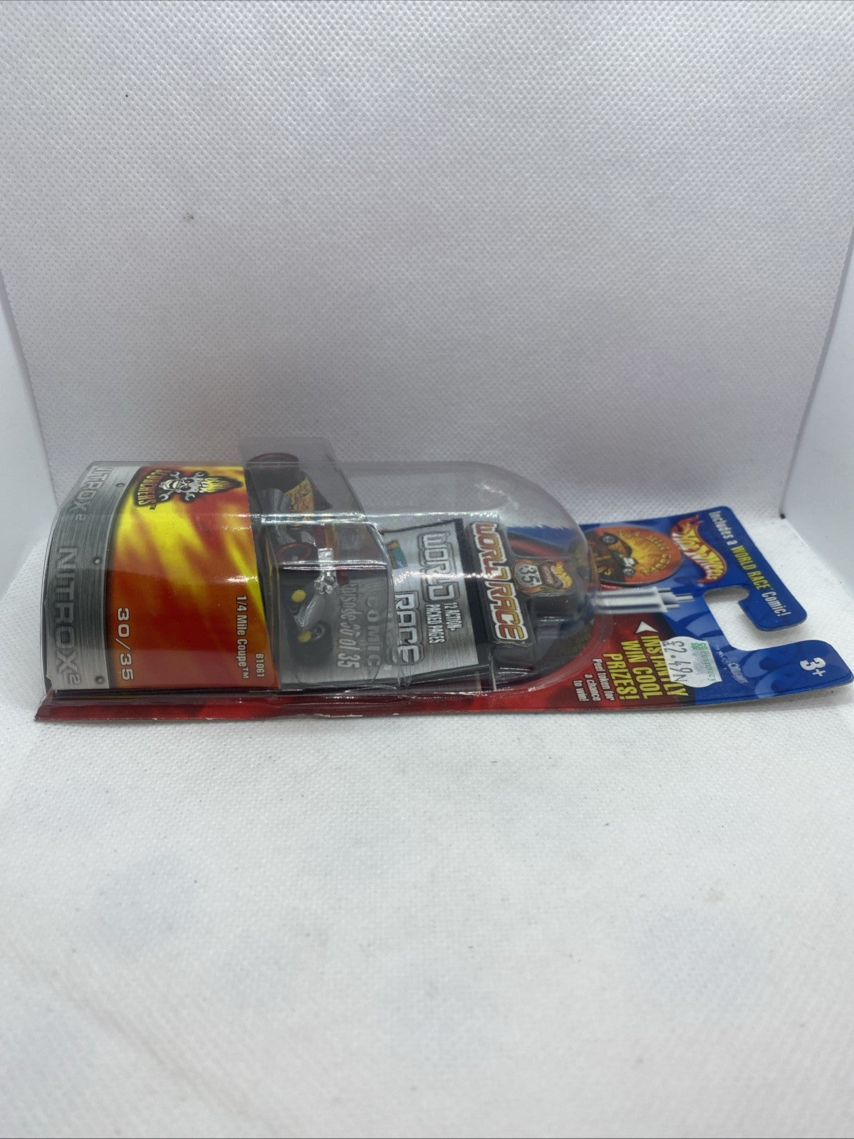 Sealed blister pack with black Scorchers race car and flame graphics card backing