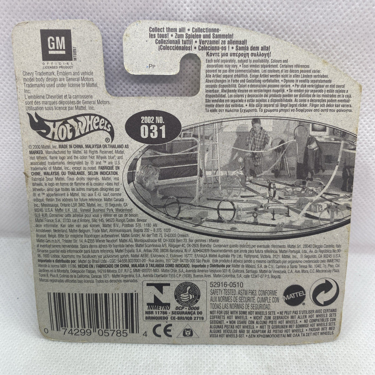 Hot Wheels packaging back card with GM logo and 2002 No. 031 details