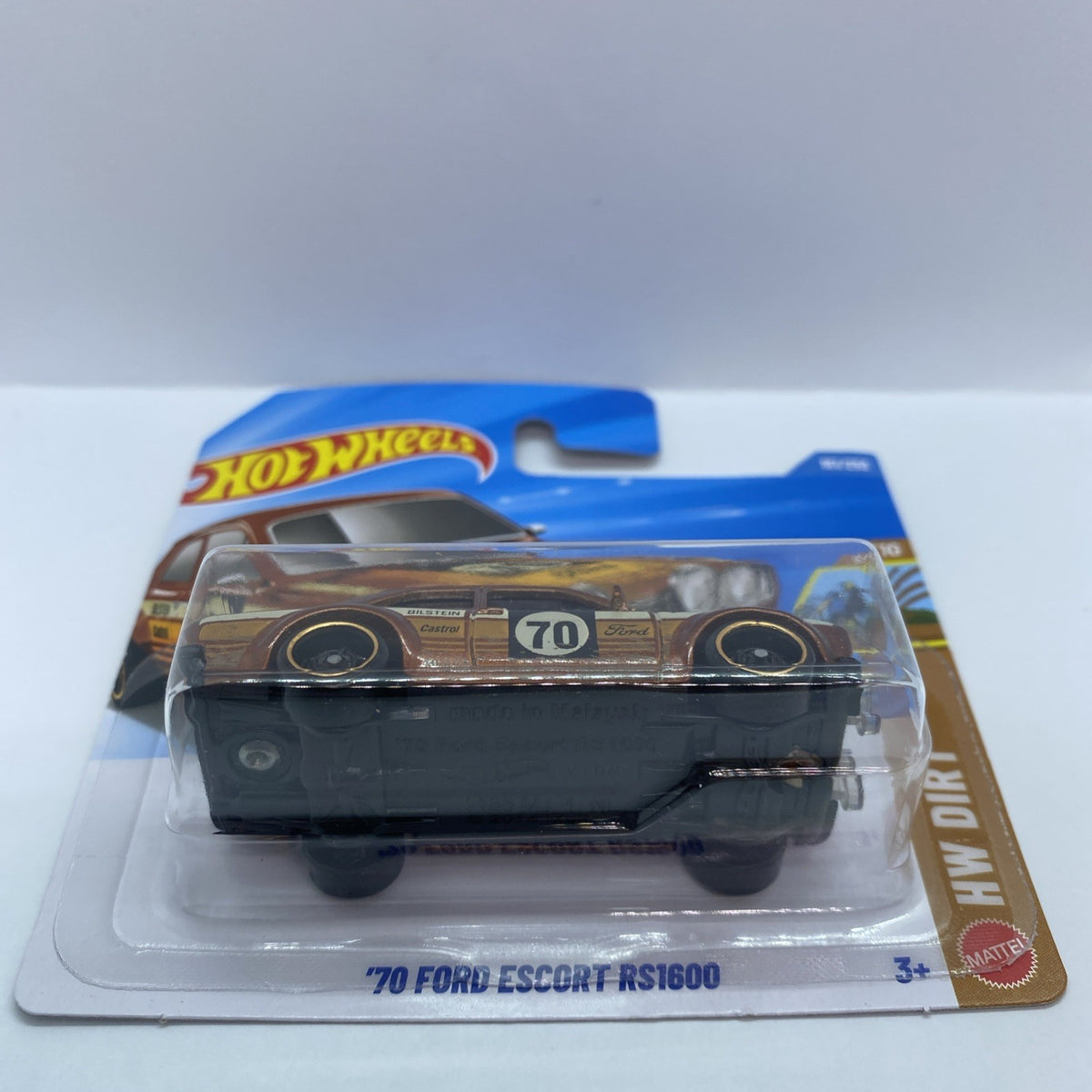 Hot Wheels 1:64 die-cast car in blister, brown side profile view