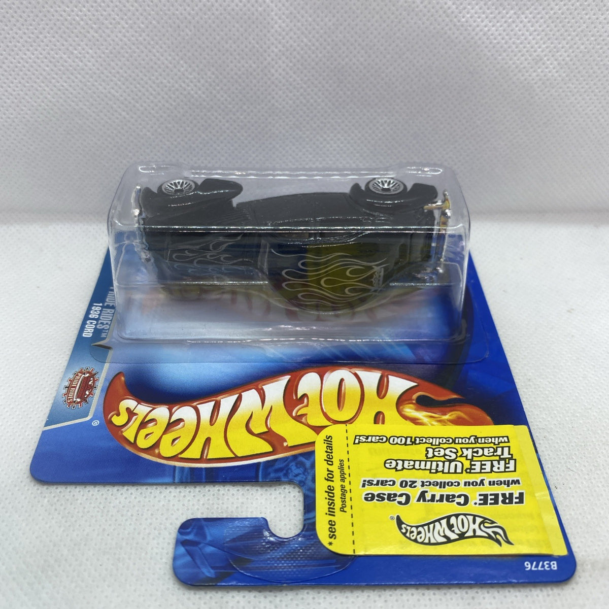 Hot Wheels 1936 Cord 2004 die-cast car on blister card, top and side view