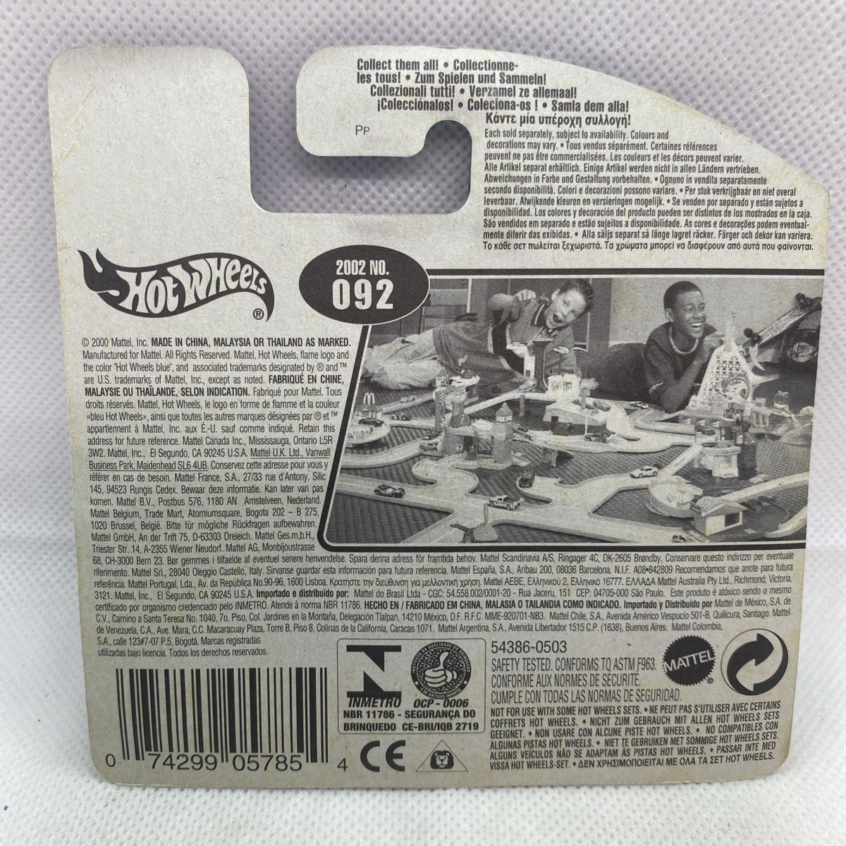 Hot Wheels blister card back with vehicle number 092 and manufacturer info, sealed