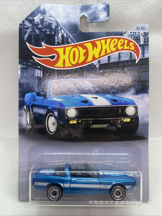 Blue Hot Wheels '69 Shelby GT500 die-cast car in blister on short card