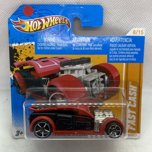 Hot Wheels diecast car, red and black with silver engine details, sealed blister