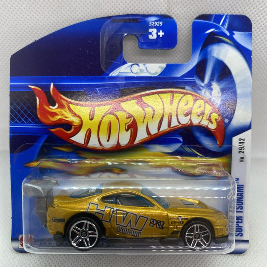 Hot Wheels Super Tsunami die-cast car in sealed short card blister, gold and black