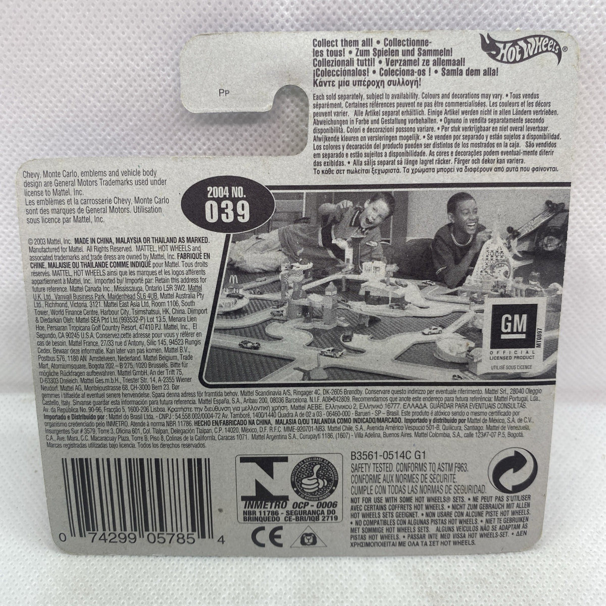 Hot Wheels car package back card with 2004 No. 039, barcode and printed GM photo