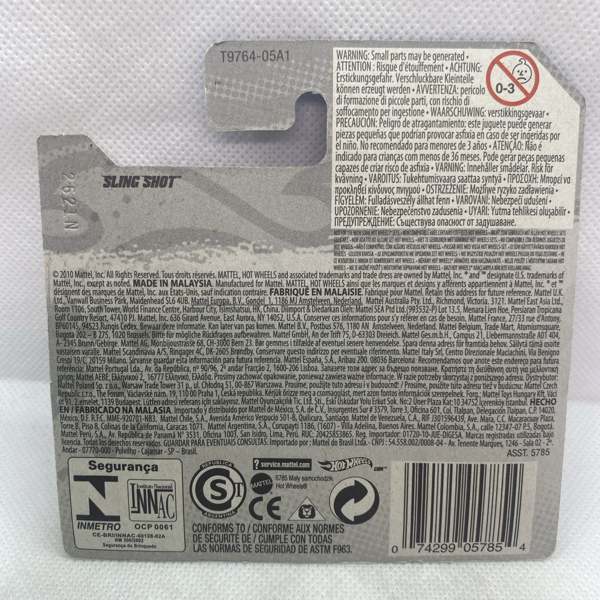 Back of blister card with barcode and safety warnings for Hot Wheels