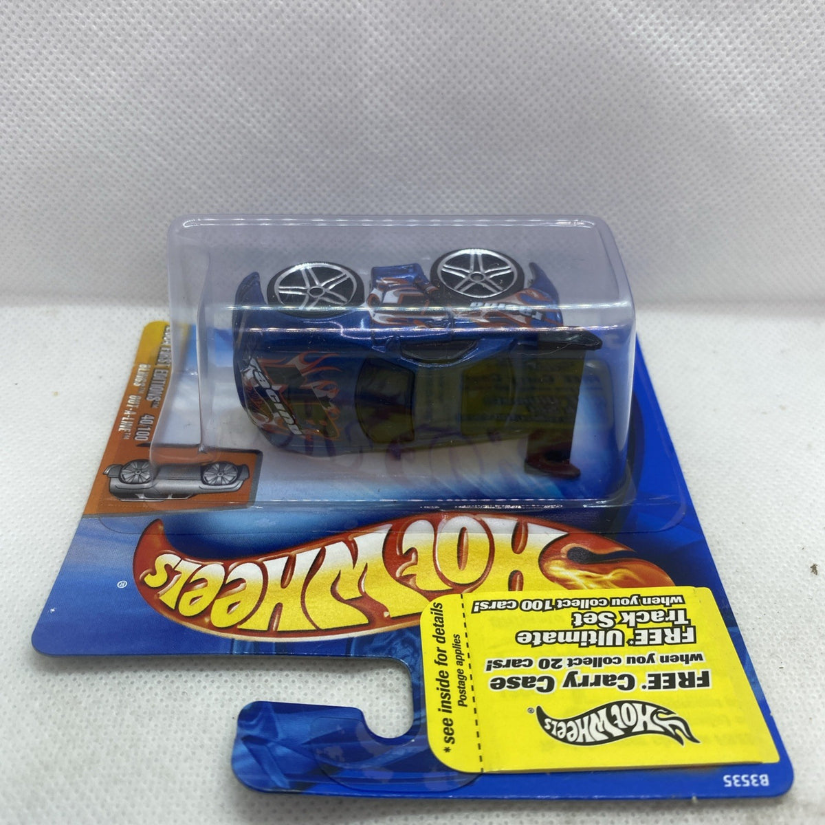 Hot Wheels die-cast car in blister pack with chrome wheels and blue body