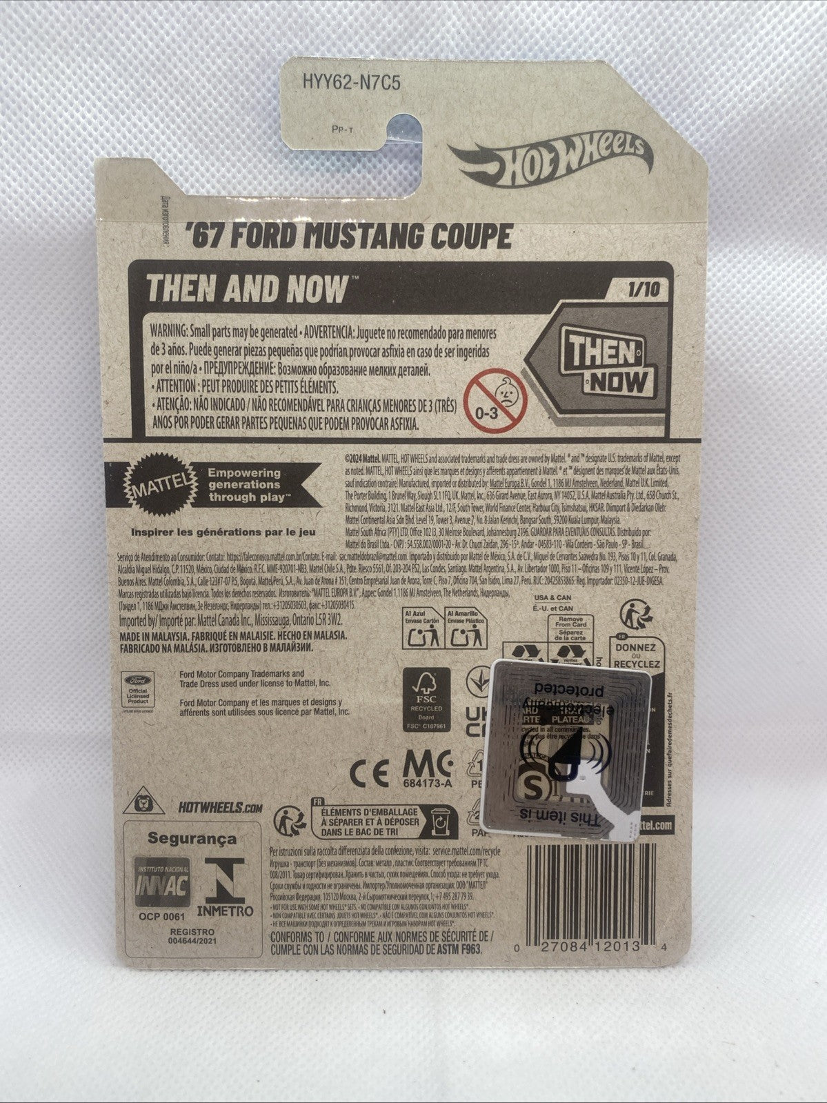 Hot Wheels die-cast car back card with barcode, details, and “Then and Now” logo